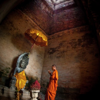 Angkor Wat temple with monk