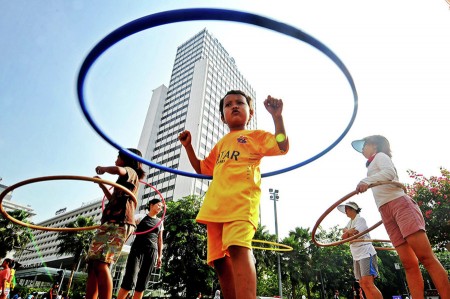 playing hula hoops