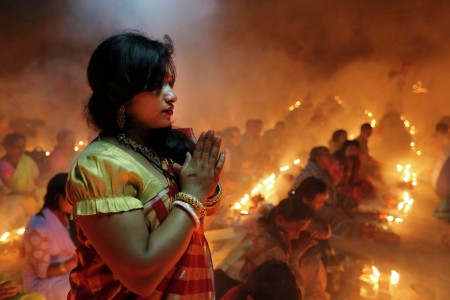 Praying herself