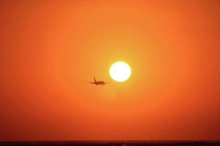 Flying towards sunset