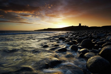 Dunstanburgh castle and sunrise