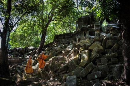Angkor Wat temple with monk