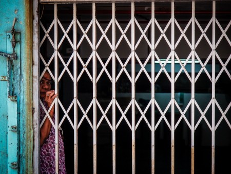 Behind the steel bar