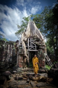 Angkor Wat temple with monk, Siem Reap, Cambodia