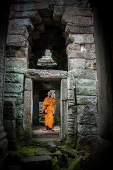 Angkor Wat temple with monk