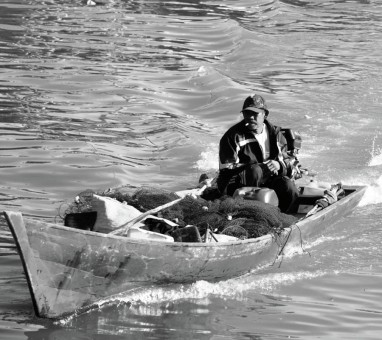 Fisherman on his boat