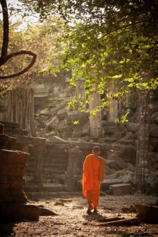 Angkor Wat temple with monk