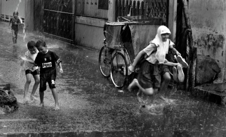 kids and amazing tropical rain