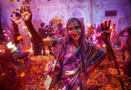 Widow enjoying Holi