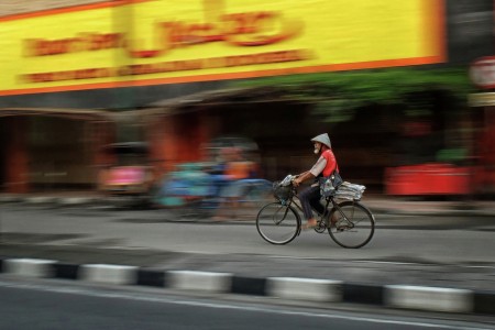 Delivering Newspaper
