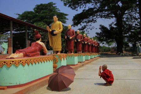 Praying To Buddha Image
