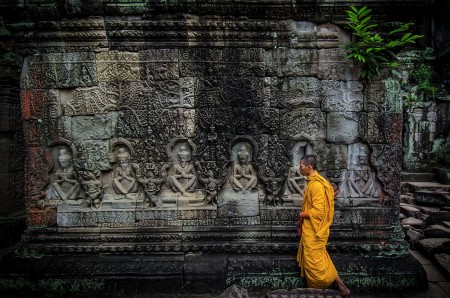 Angkor Wat temple with monk, Siem Reap, Cambodia