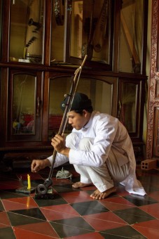Musician in Cao Dai Temple in Tay Ninh - Vietnam