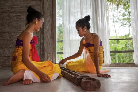 Girls playing congkak
